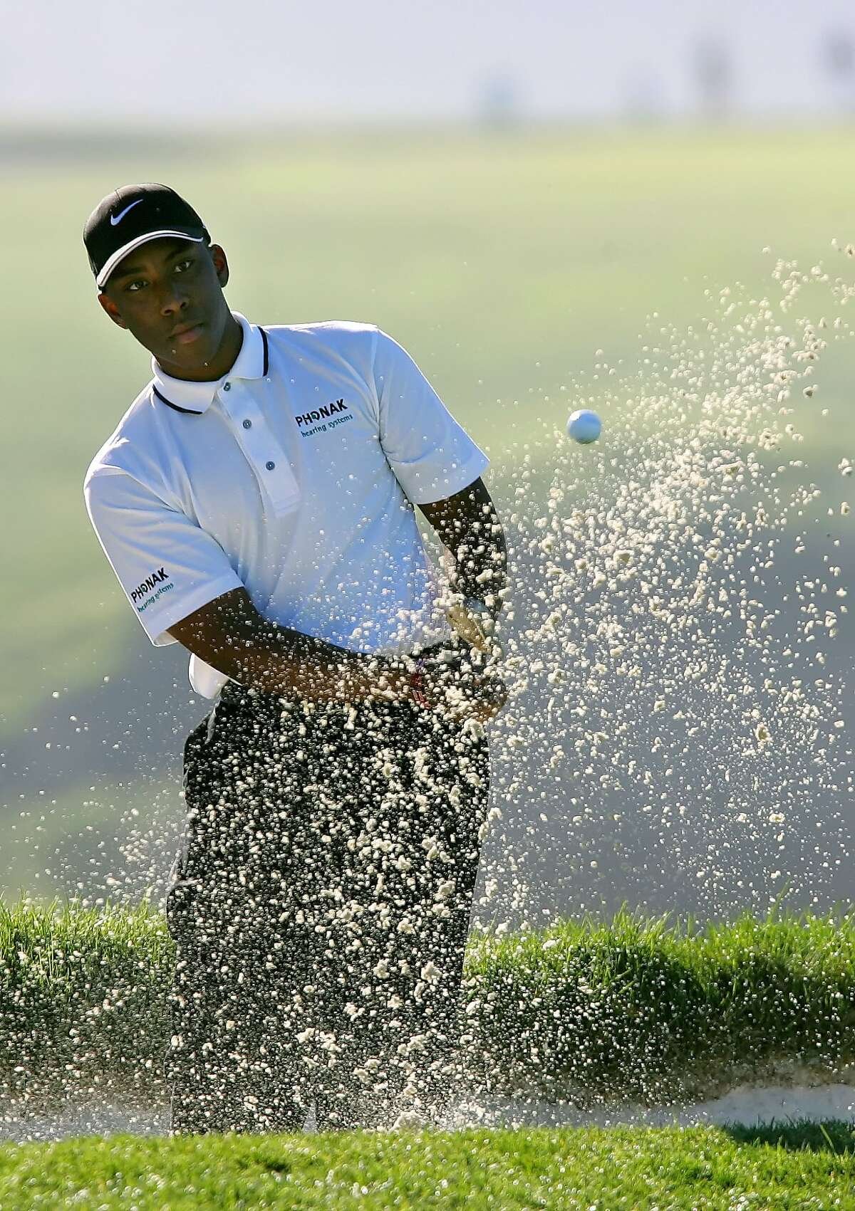 Kevin Hall hits from the bunker toward the fourth hole at Pebble Beach Golf Links during the first round of the Pebble Beach National Pro-Am golf tournament in Pebble Beach, Calif., Thursday, Feb. 9, 2006. (AP Photo/Jeff Chiu)